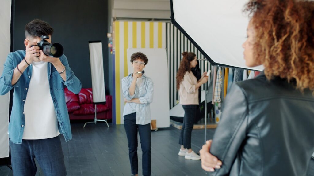 African creative professionals working together in a photography and media studio
